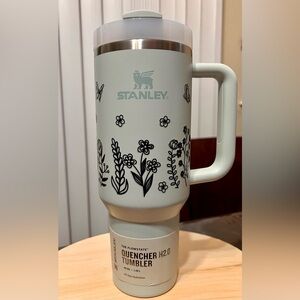 Stanley Quencher H2.O FlowState 40 Mist Green Tumbler with Black Floral Pattern